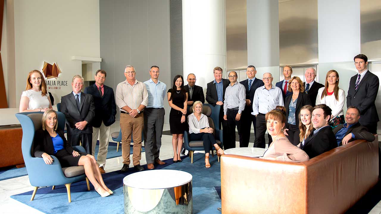 The HFM team gathered in the Australia Place building lobby